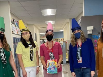 First grade team dressing up as crayons for dress as a storybook character day.