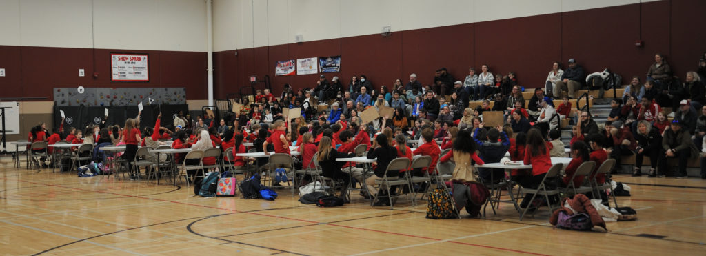 a picture of students participating in a battle of books contest