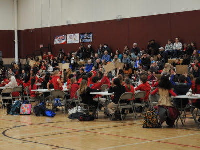a picture of students participating in a battle of books contest